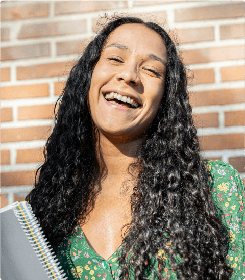 An image of a Uni student laughing